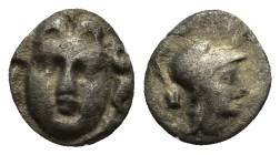 Pisidia, AR Obol Selge 3rd Century BC. (0.8 Gr. 9mm.)
Facing head of Gorgoneion 
Rev. Helmeted head of Athena right, astragal behind