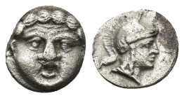 Pisidia, AR Obol Selge 3rd Century BC. (0.87 Gr. 9mm.)
Facing head of Gorgoneion 
Rev. Helmeted head of Athena right, astragal behind