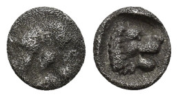Pamphylia. Aspendos circa 460-360 BC. Obol AR (0.45 Gr. 7 mm.) 
Gorgoneion with protruding tongue 
Rev. Head of lion to right.