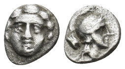 Pisidia, AR Obol Selge 3rd Century BC. (0.9 Gr. 10mm.)
Facing head of Gorgoneion 
Rev. Helmeted head of Athena right, astragal behind