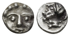 Pisidia, AR Obol Selge 3rd Century BC. (0.9 Gr. 9mm.)
Facing head of Gorgoneion 
Rev. Helmeted head of Athena right, astragal behind