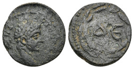 SELEUCIS AND PIERIA, Antioch, Elagabalus (218-222 AD) AE (5.04 Gr. 17mm) 
Laureate head right. 
Rev: Δ Є, legend within laurel wreath, star below.