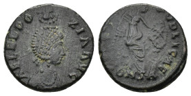 Aelia Eudoxia, wife of Arcadius. Constantinople, circa AD 401-405 Follis, Æ (16mm, 2.5 g) AEL EVDO-XIA AVG, diademed draped bust right being crowned b...
