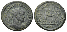 Diocletian AD 284-305. Rome Antoninian AE. (3.83 Gr. 22mm.)
Radiate, draped and cuirassed bust right 
Rev. Diocletian standing right, holding parazoni...