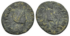 Eudoxia AD, 401-403 AE. Constantinople, (2.22 Gr. 18mm.). 
Bust draped right, crowned by hand of God. 
Rev. Victory seated right on cuirass inscribing...