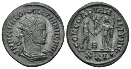 Diocletian AD 284-305. Rome Antoninian AE. (4.37 Gr. 21mm.)
Radiate, draped and cuirassed bust right 
Rev. Diocletian standing right, holding parazoni...