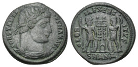 CONSTANTINE I THE GREAT (307-337). Follis. Antioch. (2.65 Gr. 18mm.)
Diademed, draped and cuirassed bust right. 
Rev. Two soldiers standing facing one...