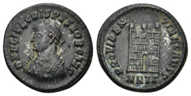 Crispus. Caesar, A.D. 317-326. AE follis (2.95 Gr. 18mm.). Thessalonica, 
Laureate, draped and cuirassed bust of Crispus left 
Rev. Camp gate with thr...