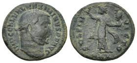 Maximinus Daia, 312 AD. AE follis (4.1 Gr. 21mm.)
laureate head right 
Rev. Sol standing left with raised hand and head of Serapis.