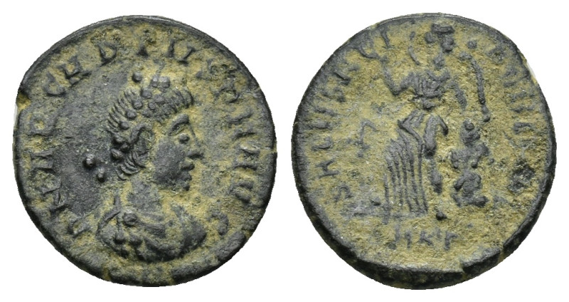 Arcadius. AD 383-408. AE. (1.25 Gr. 13mm.). Cyzicus 
Rev. Victory advancing left...