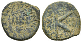 Maurice Tiberius. 582-602. Æ half follis (20mm, 5.81 g). Thessalonica mint. D N MAVRC TIB PP AV, helmeted and cuirassed bust facing, holding globus cr...