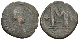 Justin I. 518-527. Æ Follis – 40 Nummi (28mm, 15.2 g). Constantinople mint, 3rd officina. Struck 518-527. Diademed, draped, and cuirassed bust right /...