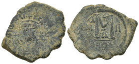 Maurice Tiberius. 582-602. AE Follis (33mm, 11.64 g). A.D. 589/90. Helmeted and cuirassed bust facing holding globus cruciger and shield / Large M bet...