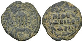 ANONYMOUS FOLLiS. Attributed to Basil II & Constantine VIII (976-1025). AE (26mm, 5.61 g) Facing bust of Christ Pantokrator. Rev: Legend in four lines...