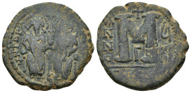 Justin II, with Sophia. 565-578. Æ follis. (28mm, 11.8 g). Theoupolis (Antioch) mint, 3rd officina. Dated RY 7 (571/572). Justin and Sophia seated fac...