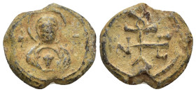 Byzantine Lead Seal Obv: Facing bust of the Virgin Mary, holding Christ medallion on breast. Rev: Cruciform monogram. 20mm, 5.93 gr.