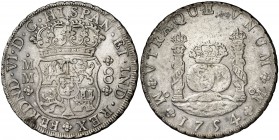 1754. Fernando VI. México. MM/MF. 8 reales. (Cal. 334 var). 26,96 g. Columnario. Dos coronas reales. Muy rara. MBC.