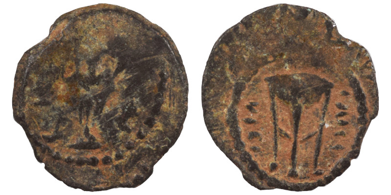 Greek. Ae (bronze, 0.58 g, 12 mm). Tripod. Rev. Kantharos. Good fine.