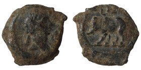 EGYPT. Alexandria. Trajan, 98-117. Ae (bronze, 1.53 g, 15 mm). Laureate head to right. Rev. Rhinoceros(?) standing to left; L [IZ?] (date) above. RPC ...