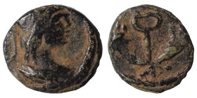 PALMYRENE. Palmyra. Pseudo-autonomous issue, circa 2nd-3rd centuries AD. Ae (bronze, 0.68 g, 10 mm). Helmeted head of Athena. Rev. Winged caduceus bet...