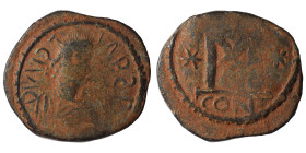 Justin I, 518-527. Follis, contemporary imitation (bronze, 13.37 g, 32 mm), Constantinople. Blundered legend, Bust of Justin I right. Rev, Large M, st...