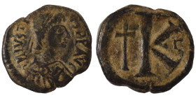 Justin I, 518-527. Half Follis (bronze, 5.83 g, 22 mm), Antioch. D N IVSTINVS P P AVG Diademed, draped and cuirassed bust of Justin I right. Rev. Larg...