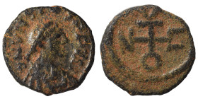 Justin I, 518-527. Pentanummium (bronze, 0.70 g, 10 mm), Theoupolis (Antioch). D N IVSTINVS P AVG Pearl-diademed, draped and cuirassed bust to right. ...