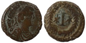 Justinian I, 527-565. Decanummium (bronze, 4.92 g, 17 mm). Rome. Diademed, draped and cuirassed bust right. Rev. Large I between two stars; all within...