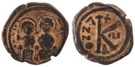 Justin II, with Sophia, 565-578. Half Follis (bronze, 7.15 g, 23 mm), Constantinople. Justin, holding globus cruciger, and Sophia, holding cruciform s...