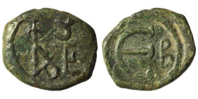 Justin II, 565-578. Pentanummium (bronze, 1.92 g, 15 mm), Theoupolis (Antioch). Monogram of Justin II. Rev. Large Є, B to right. SB 363. Nearly very f...