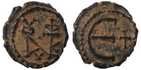 Justin II, 565-578. Pentanummium (bronze, 1.70 g, 14 mm), Theoupolis (Antioch). Monogram of Justin II. Rev. Large Є, cross to right. SB 386. Very fine...