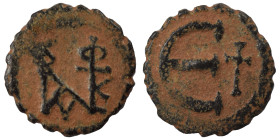 Justin II, 565-578. Pentanummium (bronze, 1.26 g, 14 mm), Theoupolis (Antioch). Monogram of Justin II. Rev. Large Є, cross to right. SB 386. Very fine...