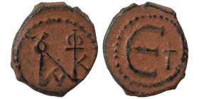 Justin II, 565-578. Pentanummium (bronze, 2.12 g, 16 mm), Theoupolis (Antioch). Monogram of Justin II. Rev. Large Є, cross to right. SB 386. Very fine...