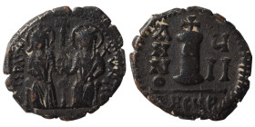 Justin II, with Sophia. 565-578. Decanummium (bronze, 3.03 g, 19 mm), Theoupolis (Antioch). Justin II, holding scepter in his right hand, and Sophia, ...