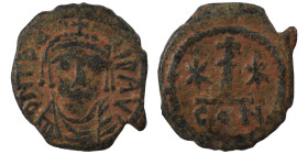 Maurice Tiberius, 582-602. Decanummium (bronze, 1.81 g, 18 mm), Constantinople. D N TIBER P P AV Crowned, draped and cuirassed bust facing. Rev. Large...