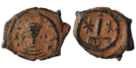 Maurice Tiberius, 582-602. Decanummium (bronze, 3.04 g, 21 mm), Constantinople. [D N TIBER P P AV] Crowned, draped and cuirassed bust facing. Rev. Lar...