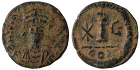 Maurice Tiberius, 582-602. Dekanummium (bronze, 2.29 g, 16 mm), Constantinople. Helmeted, draped, and cuirassed bust facing. Rev. Large I between star...