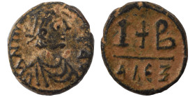 Maurice Tiberius. 582-602. 12 Nummi (bronze, 3.84 g, 16 mm), Alexandria,. D N m[…]AV diademed, draped and cuirassed bust right, holding cross. Rev. Cr...