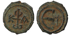 Phocas, 602-610. Pentanummium (bronze, 1.49 g, 14 mm), Theoupolis (Antioch). Monogram of Phocas. Rev. Large Є, cross above. DOC -; MIB 89; SB 676A. Ne...