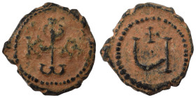 Phocas, 602-610. Pentanummium (bronze, 1.74 g, 14 mm), Theoupolis (Antioch). Monogram of Phocas. Rev. Large Ч, cross above. DOC -; MIB 89; SB 676A var...