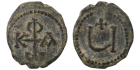 Phocas, 602-610. Pentanummium (bronze, 1.13 g, 14 mm), Theoupolis (Antioch). Monogram of Phocas. Rev. Large Ч, cross above. DOC -; MIB 89; SB 676A var...