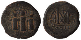 Heraclius, with Martina and Heraclius Constantine. 610-641. Follis (bronze, 7.54 g, 24 mm), Constantinople. Heraclius, in center, flanked by Martina, ...