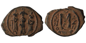 Arab-Byzantine. Circa 640-650. Imitating 'Cyprus follis of Heraclius", 610-641. Follis (bronze, 5.08 g, 29 mm), Uncertain mint in Syria. Three standin...