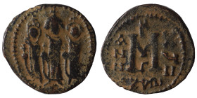 Arab-Byzantine. Circa 640-650. Imitating 'Cyprus follis of Heraclius", 610-641. Follis (bronze, 5.85 g, 24 mm), Uncertain mint in Syria. Three standin...