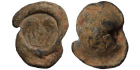 Greek-Roman seal, uncertain, 3/4th century. (lead, 7.61 g, 17 mm). Two ostrich-like birds standing. Rev. Blank. Nearly very fine.