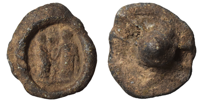 Greek-Roman seal, uncertain, 3/4th century. (lead, 5.04 g, 19 mm). Two standing ...