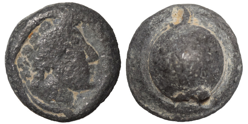 Lead seal, uncertain (lead, 12.55 g, 18 mm). Female bust right. Rev. Blank. Near...