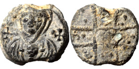 Byzantine lead seal (lead, 5.54 g, 16 mm). Facing bust of the Virgin Mary, with Christ medallion on breast. Rev. Cross. Nearly very fine.
