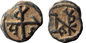 Roman or Byzantine lead seal, circa 5-6th century (lead, 4.21 g, 13 mm). Monogram. Rev. Monogram. Very fine.