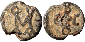 Roman or Byzantine lead seal, circa 5-6th century (lead, 3.91 g, 15 mm). Monogram. Rev. Monogram. Nearly very fine.